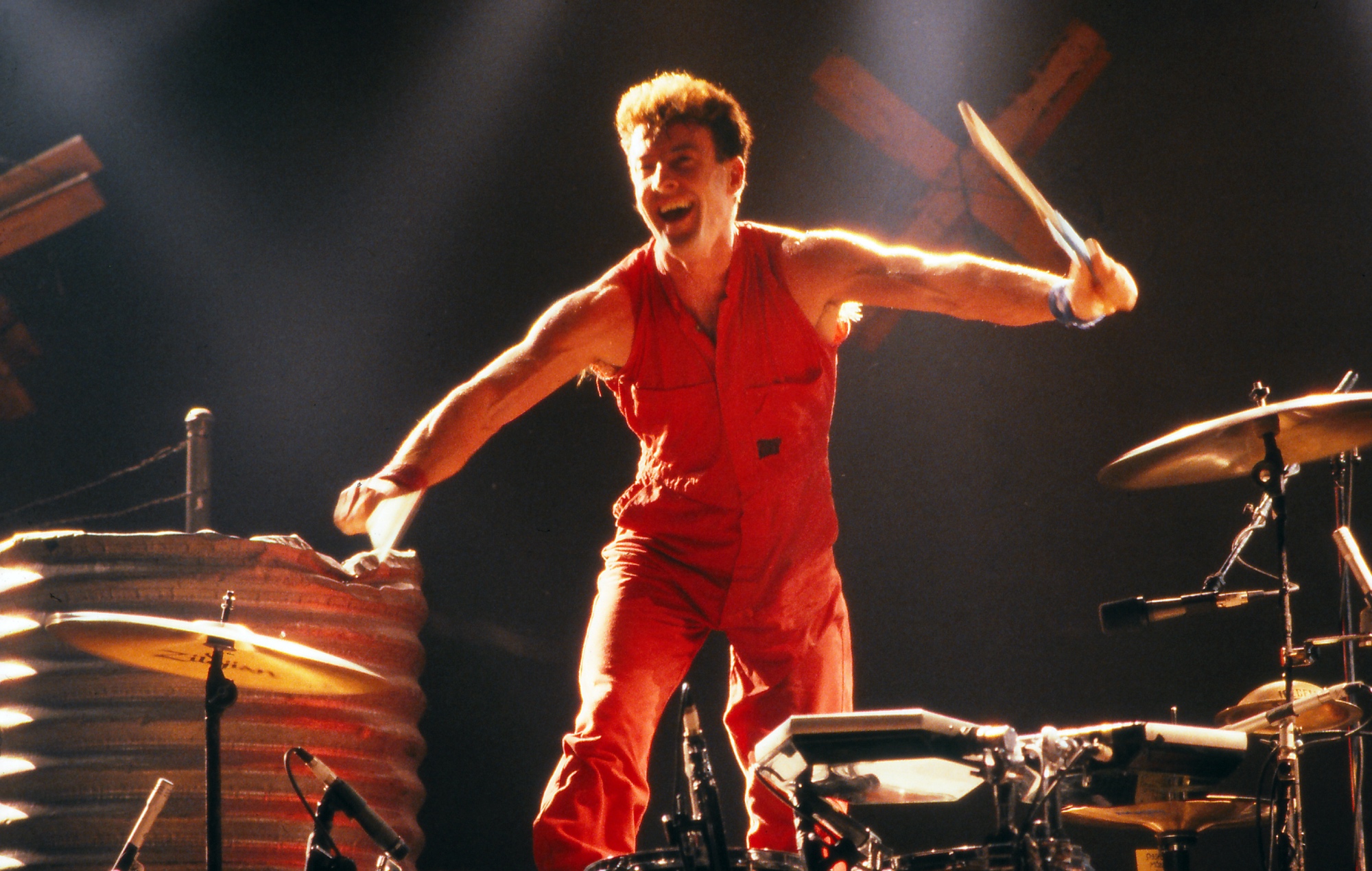 Rob Hirst of Midnight Oil performing live in 1988, photo by Bill McCay/Getty