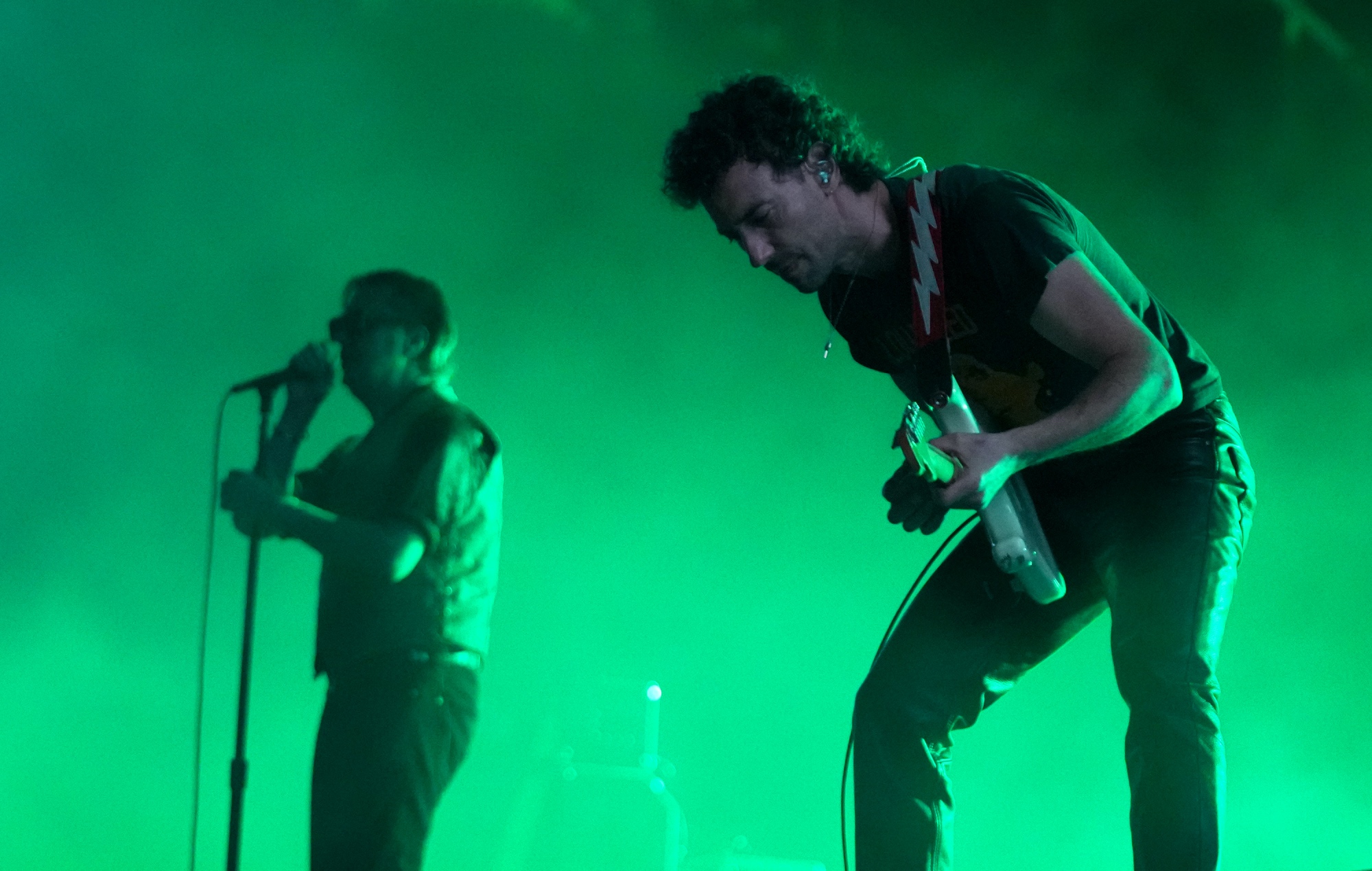 Julian Casablancas and Albert Hammond Jr performing live on stage with The Strokes, photo by Jay Janner/The Austin American-Statesman/Getty