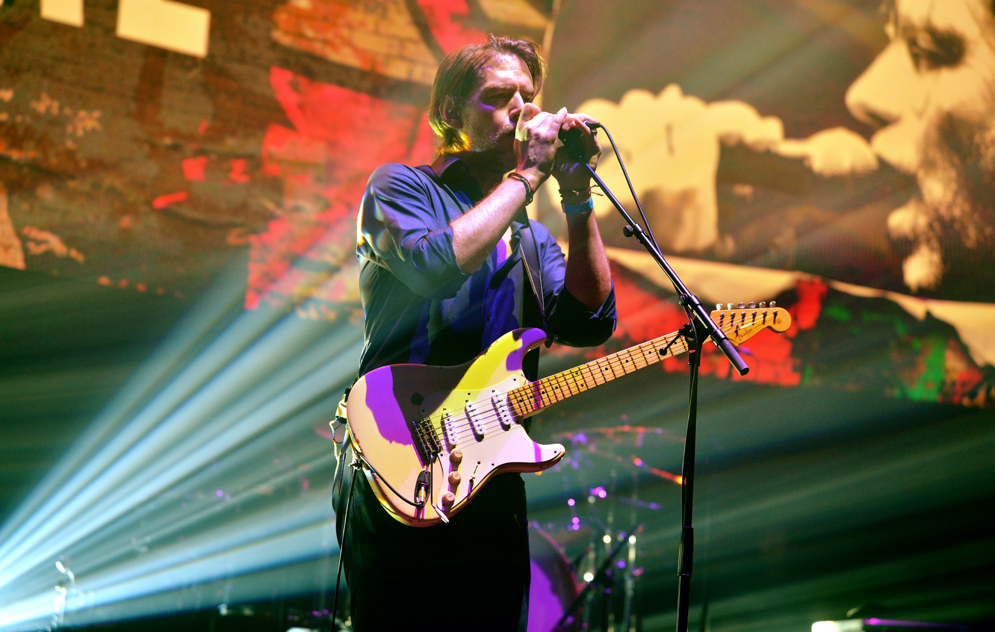 Ed O'Brien performing live on stage, photo by Jim Dyson/Getty