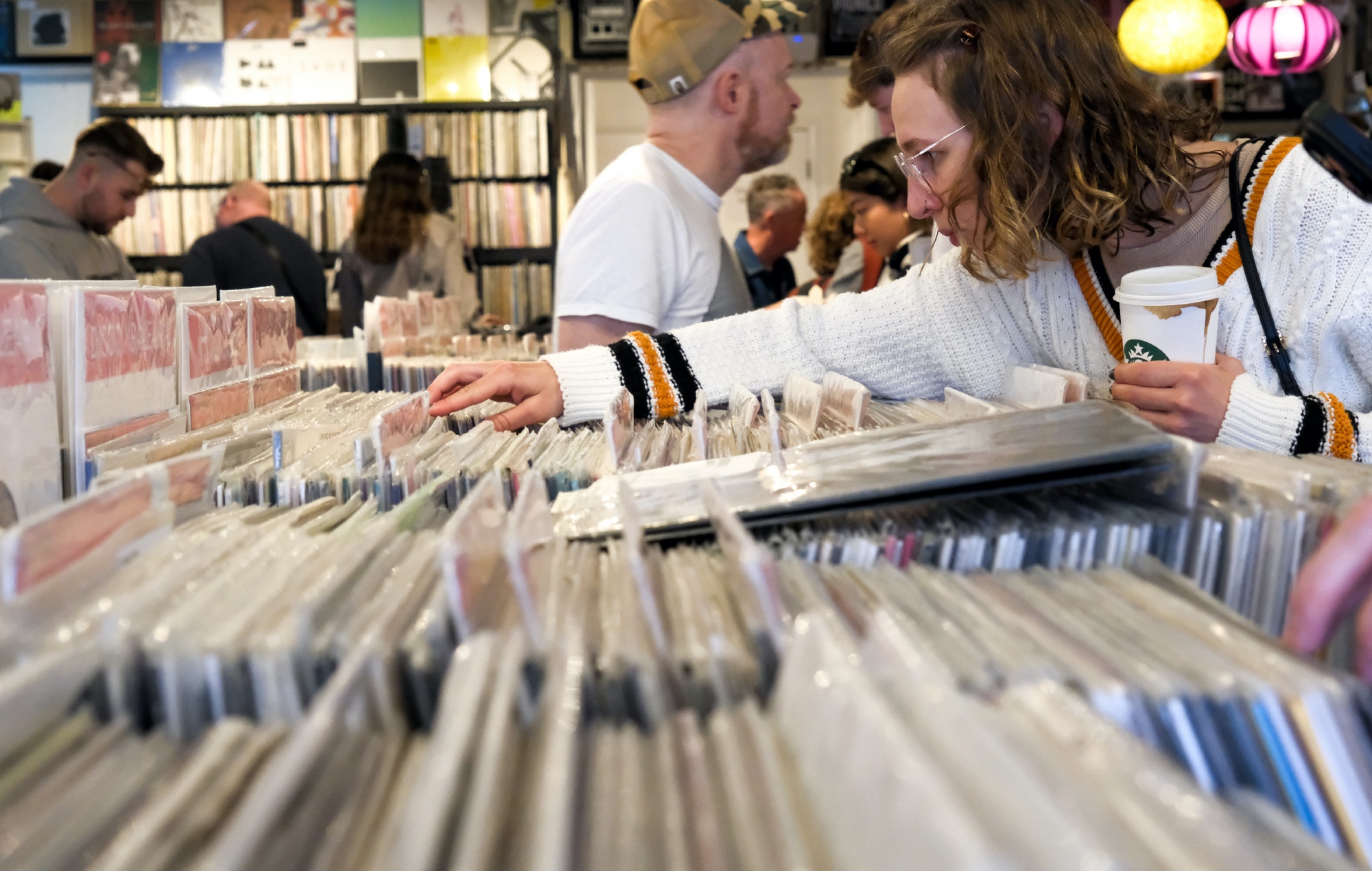 a music fan browsing in a record shop during Record Store Day 2025 in London, photo by Matthew Chattle/Future Publishing via Getty Images