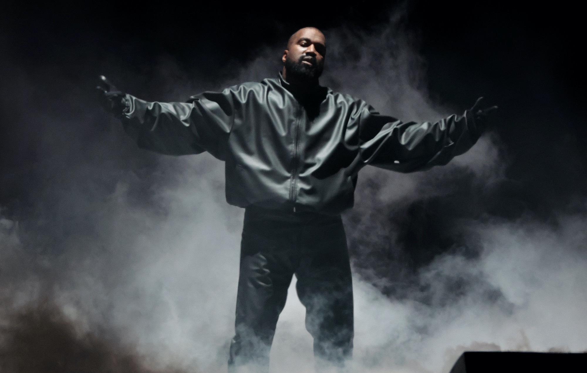 Kanye West performing live on stage, photo by Wally Skalij/Getty