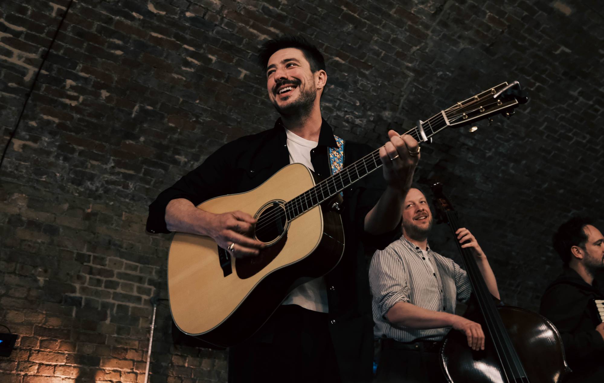 Mumford & Sons performing at Flat Iron Square in Central London. Credit: PRESS