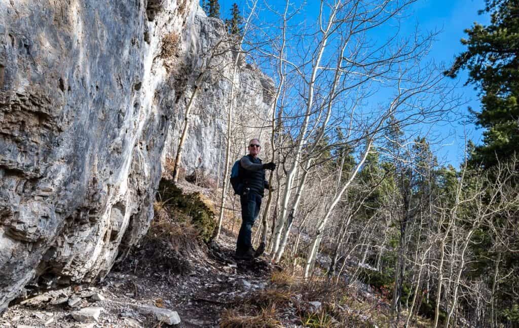 John along the trail beside the White Buddha climbing crag