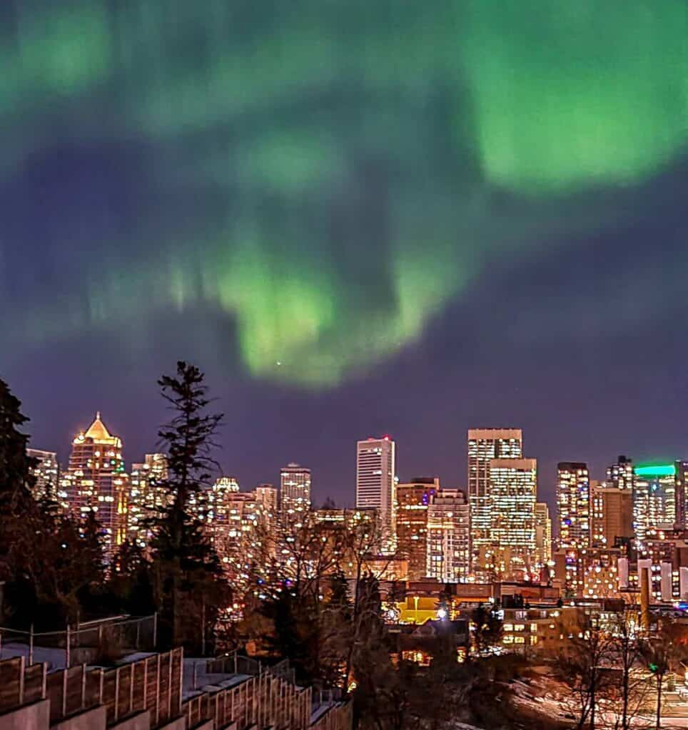 Northern Lights over Calgary's downtown around 9 PM one night in March 2023 - Lady Luck is not part of my Calgary Travel guide