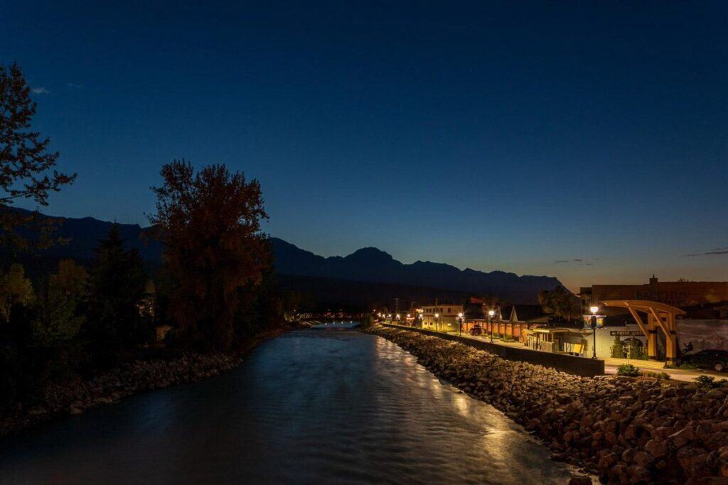 Walk a section of the Rotary Trail and cross the Kicking Horse Pedestrian Bridge
