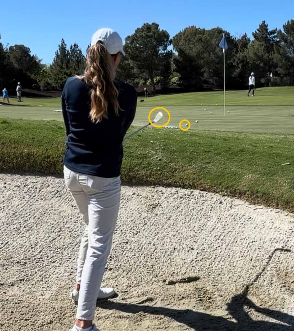 caley mcginty hits bunker shot