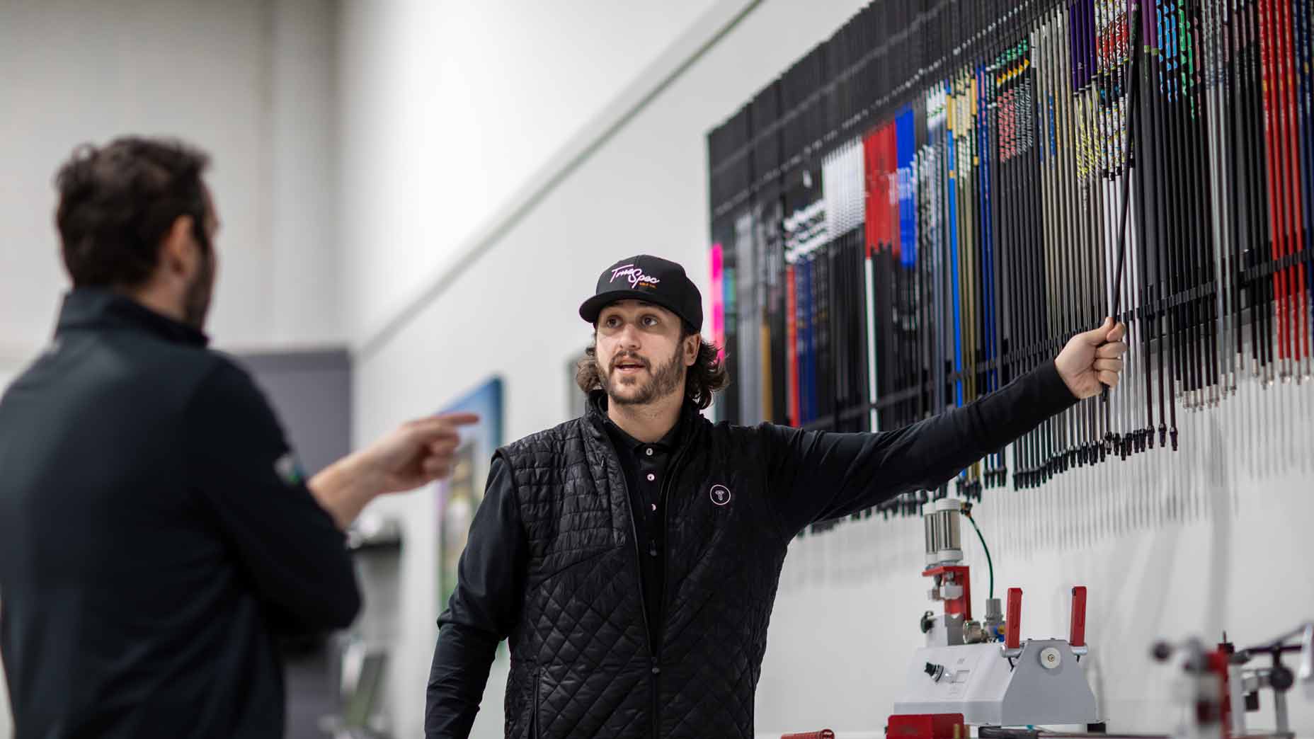 A True Spec fitter pulls a shaft from the shaft wall during a fitting.