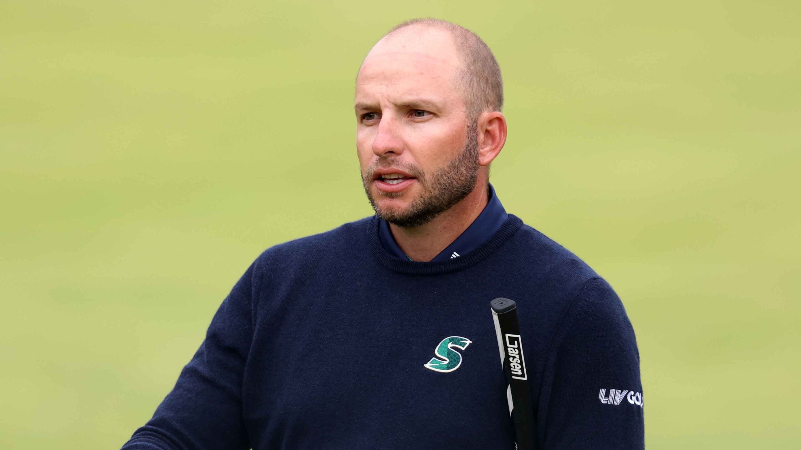 Dean Burmester of South Africa acknowledges the crowd on the 18th green during day one of The 153rd Open Championship