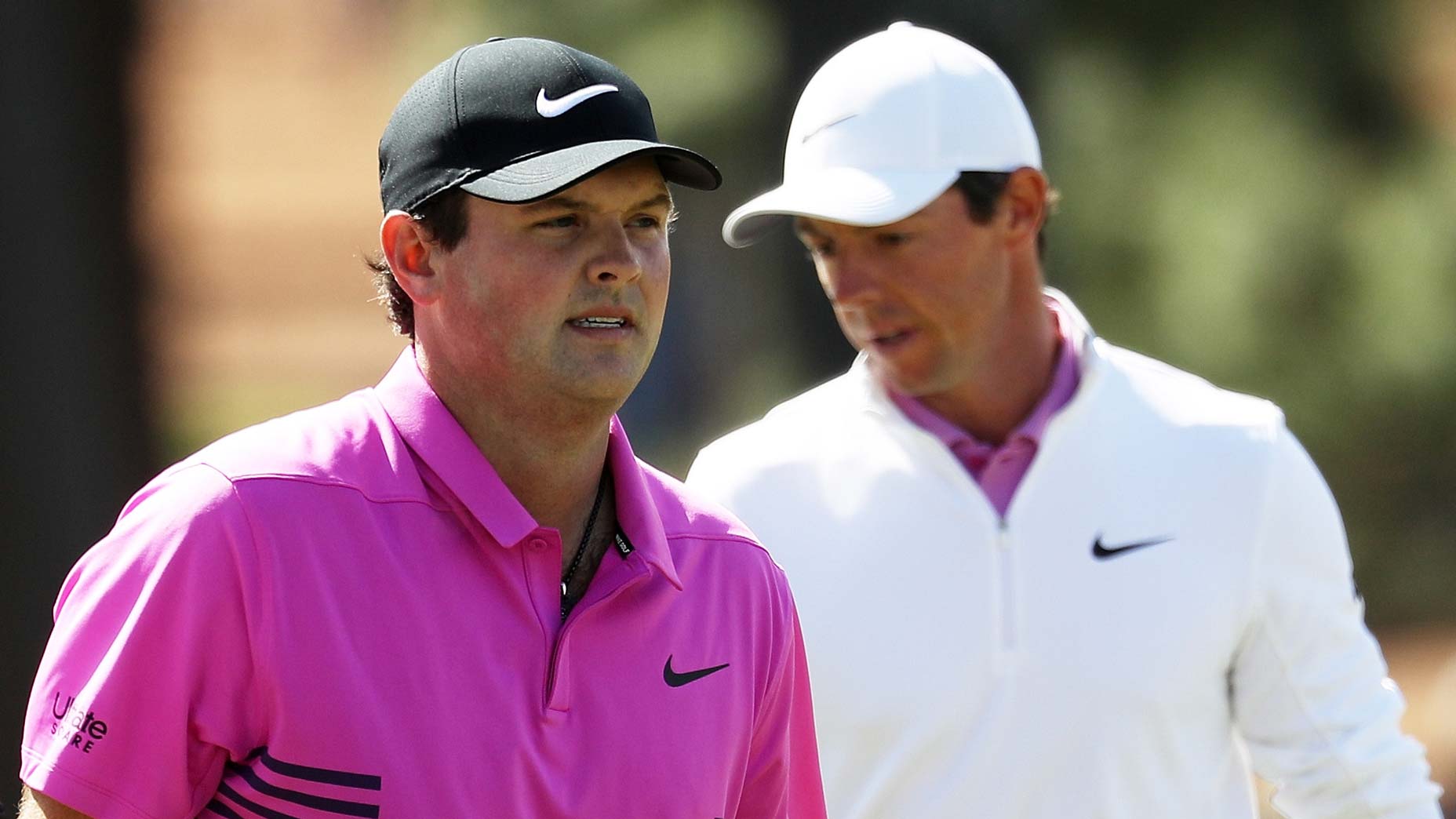 Patrick Reed and Rory McIlroy at the 2018 Masters.