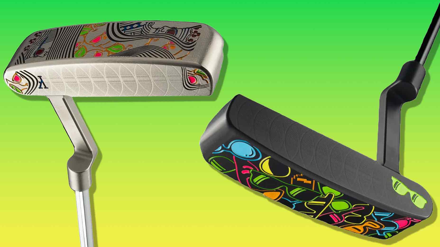 Two colorful SWAG putters are displayed on a green and yellow gradient background. Each features bold, vibrant abstract designs on the head, with one putter&rsquo;s shaft silver and the other black&mdash;perfect for those looking to shop SWAG putters in style.