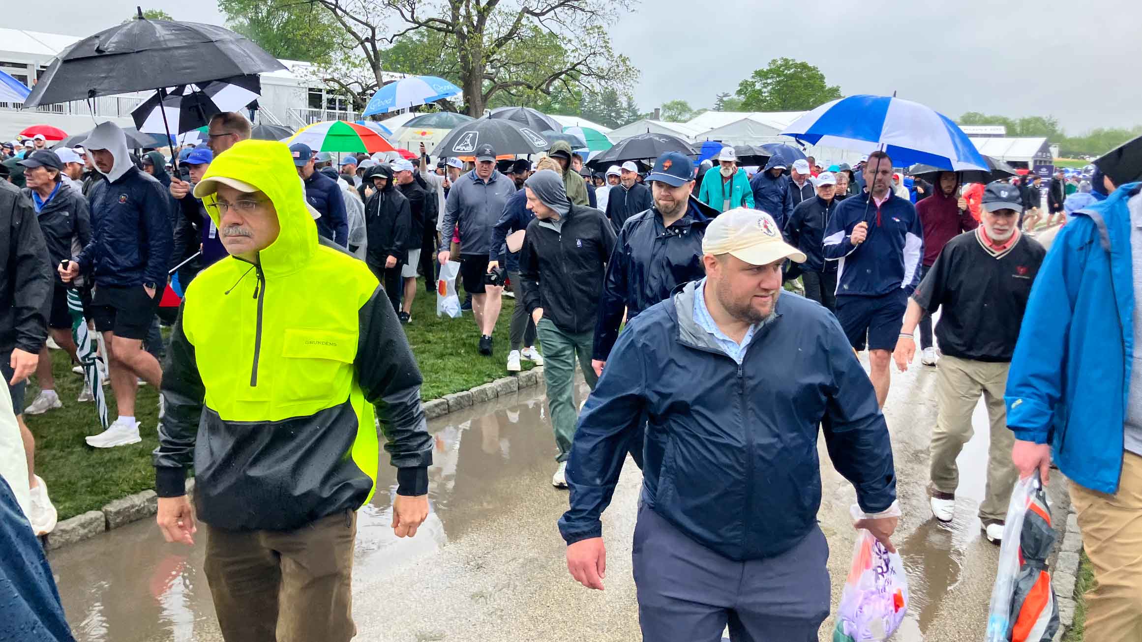 Fans braving rainy second round at truist championship