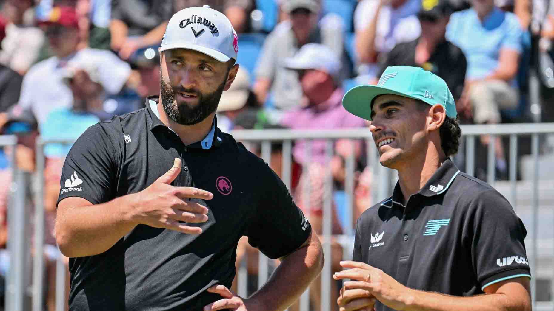Jon Rahm and Joaquin Niemann talk during LIV Adelaide