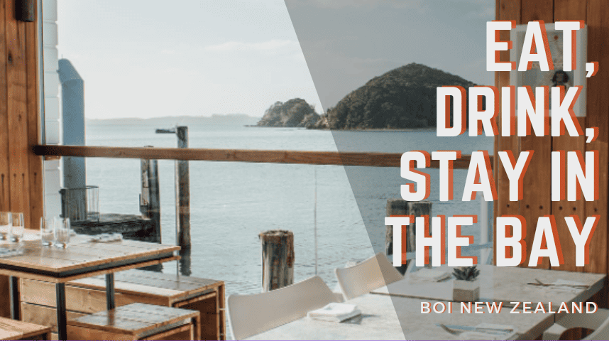 eat drink stay in the bay of islands banner. view overlooking the sea and islands from a restaurant window