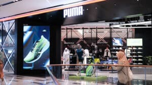 Mike Ashley’s retail empire has added another high-profile investment to its portfolio after Frasers Group quietly built a near 6 per cent stake in the German sportswear brand Puma.